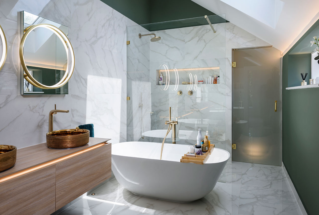 Close up on a plate of mashed potatoes, topped with baked pork chops with cream of mushroom soup, and a side of green beans.
