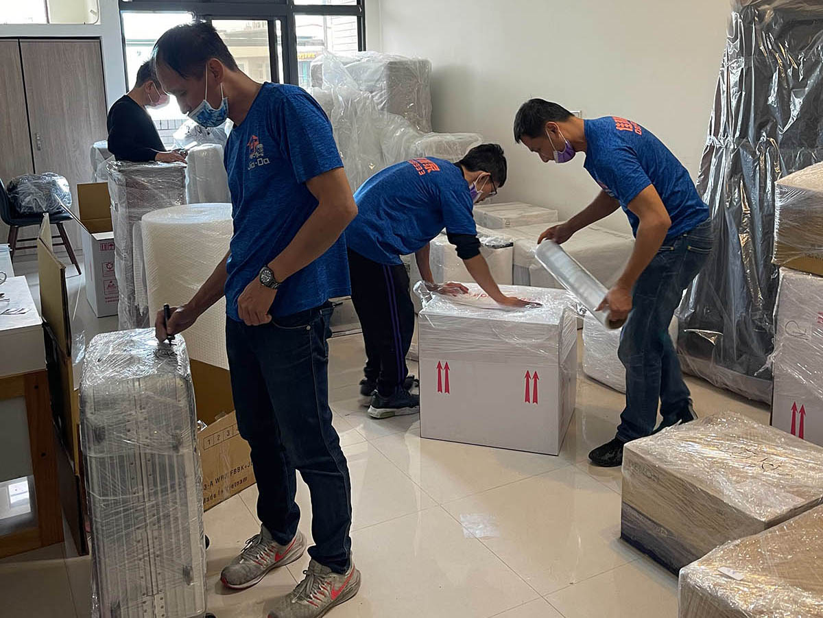 Close up on a plate of mashed potatoes, topped with baked pork chops with cream of mushroom soup, and a side of green beans.